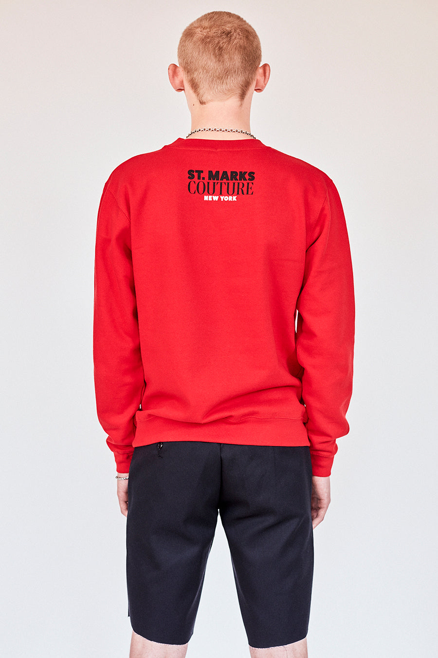 Brand New from New York City: Stmarksnewyork.com  Shop the St. Marks Street Sign red sweatshirt: Featuring St. Marks Street sign image on the front and St. Marks Couture New York logo on the back.  Hand silkscreen printed in New York with love.